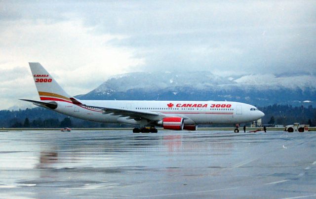 Airbus A330-300 (C-GGWB) - CYVR - January 2000 in Vancouver BC Canada we found the Canada 3000 Airbus getting set for a tow to the Terminal. This is the only Canada 3000 Airbus A330  photo I have. The jet has quite the History.!