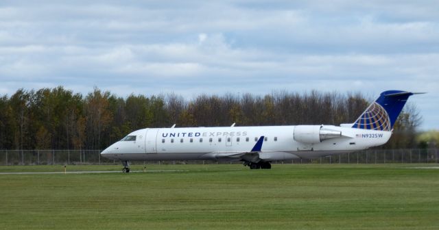 Canadair Regional Jet CRJ-200 (N932SW) - Taxiing to the terminal is this 2002 United Express Skywest Canadair Regional Jet 200 in the Autumn of 2020.