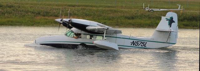 — — - Grumman Widgeon taking a bath.