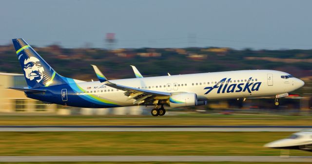 Boeing 737-900 (N434AS) - 12R arrival at sunset.