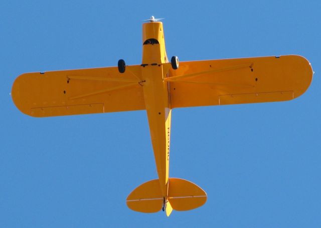 Piper L-21 Super Cub (N60NG) - Flying over the Downtown Shreveport airport.