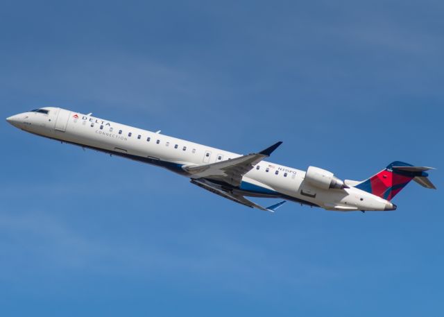 Canadair Regional Jet CRJ-900 (N315PQ) - Endeavor Air 5330 blasting out of CVG, as it begins its journey to Boston!