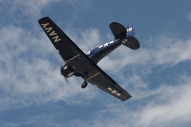 — — - Navy SNJ Landing Runway 27 Oshkosh July 23, 2011