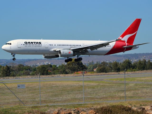 BOEING 767-300 (VH-ZXF) - Seconds from touch down on runway 05. Thursday 12th April 2012.