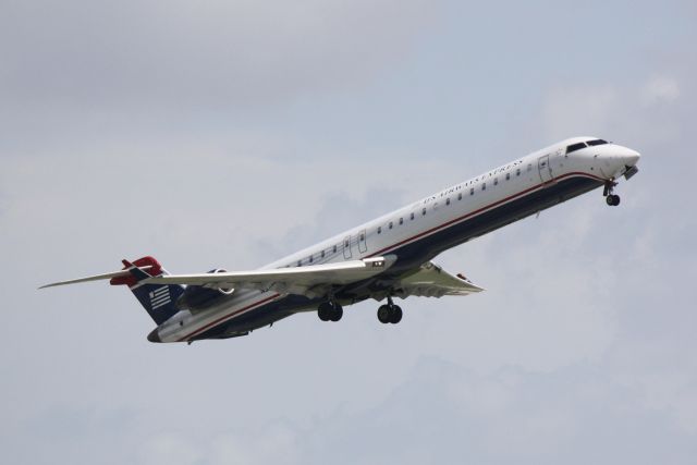 Canadair Regional Jet CRJ-900 (N914FJ) - US Air Flight 2607 operated by Mesa (N914FJ) departs Sarasota-Bradenton International Airport enroute to Charlotte Douglas International Airport