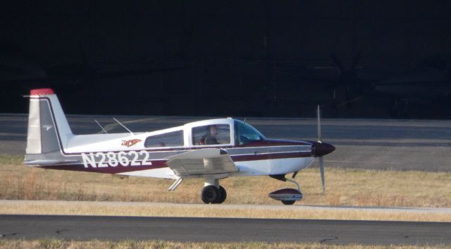 Grumman AA-5 Tiger (N28622) - Taxiing to the terminal is this 1978 Grumman    Tiger in the Winter of 2018.