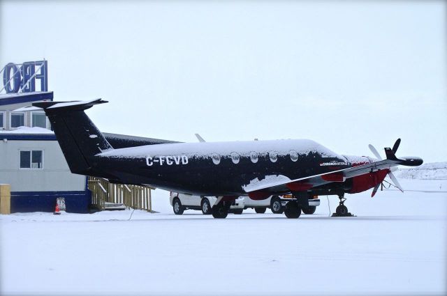 Pilatus PC-12 (C-FCVD) - It was snowing in Iqaluit, Nunavut on this day. 