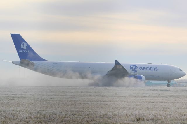 Airbus A330-300 (G-EODS) - A Geodis (operated by Titan Airways) A330-300P2F slowing down after landing at Stansted Airport.br /br /Location: Belmer Road, Stansted.br /Date: 11.12.22 (dd/mm/yy).