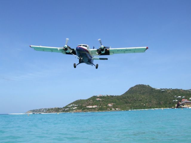 De Havilland Canada DHC-3 Otter (PJ-WIL) - Twin Otter coming in over St. Jean Beach