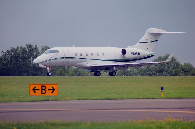 Bombardier Challenger 300 (N497EC) - departing 18 OXC