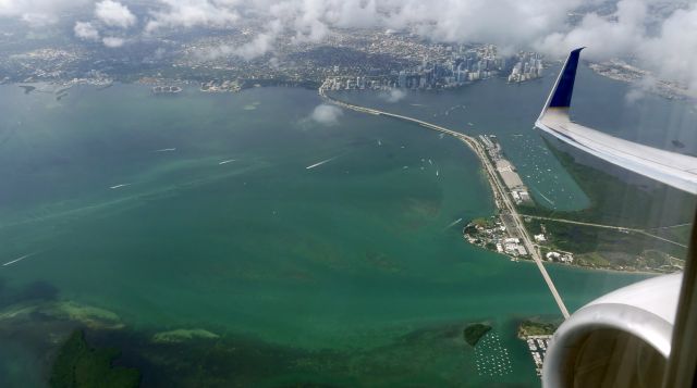 Boeing 737-800 (HP-1723CMP) - Climbout from KMIA vertical Key Biscayne enroute to MPTO.