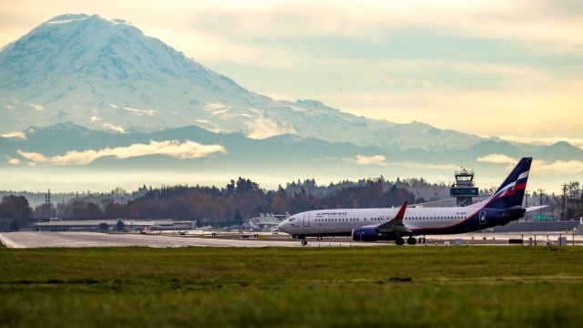 Boeing 737-800 (VQ-BWF) - Freshly painted Aeroflot 737-800 taxis to the active at Boeing Field, Seattle with Mt Rainier providing a dramatic backdrop.