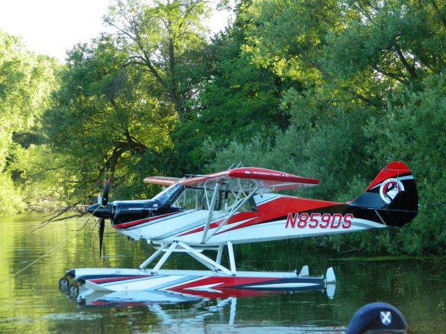 CHRISTEN Husky (N859DS) - An Aviat Husky on floats sits moored in the seaplane base at OSH 17