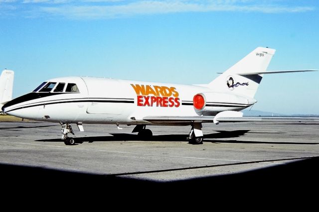 Robinson R-44 (VH-BBR) - WARD EXPRESS - DASSAULT FALCON 20 - REG : VH-BBR (CN ) - ESSENDON MELBOURNE VIC. AUSTRALIA - YMEN 4/4/1980 35M SLIDE CONVERSION USING A LIGHTBOX AND A NIKON P80 DIGITAL CAMERA IN THE MACRO MODE.