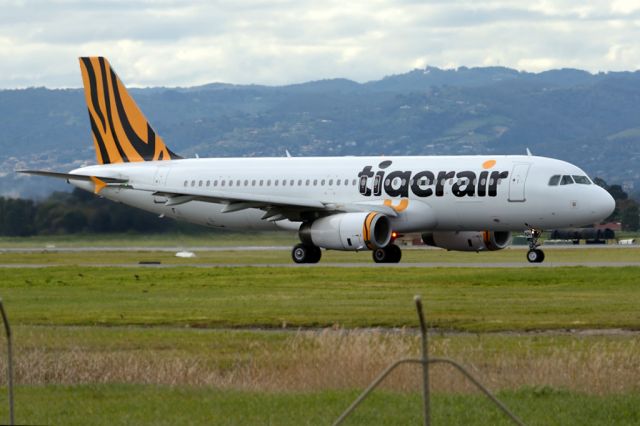 Airbus A320 (VH-VNH) - On taxiway heading for take-off on runway 05. Thursday 7th August 2014