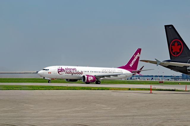 Boeing 737 MAX 8 (C-FAXD) - Out to capture this livery before it gets repainted.