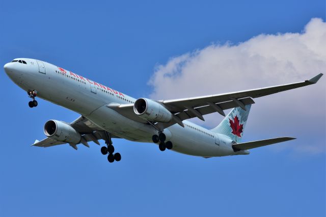 Airbus A330-300 (C-GHKR) - Air Canada Airbus A330-343 arriving at YYC on May 26.