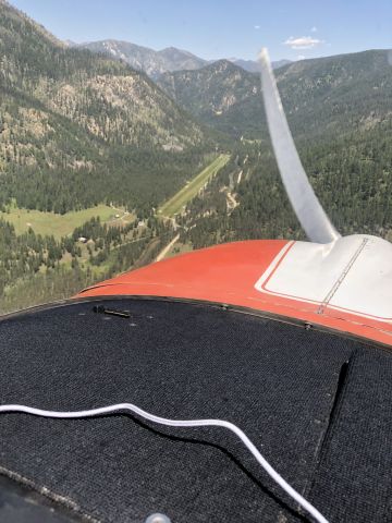 Grumman AA-5 Tiger (N4557S) - Left downwind for Johnson Creek ID in a narrow valley.