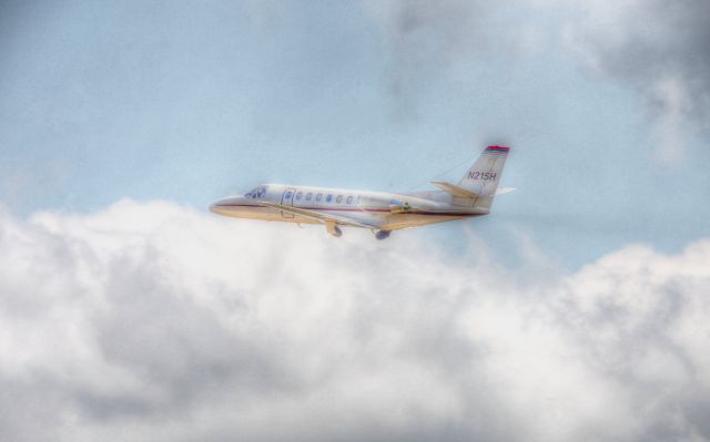 Cessna Citation V (N215H) - Leaving KPDK with the perfect backdrop for a picture