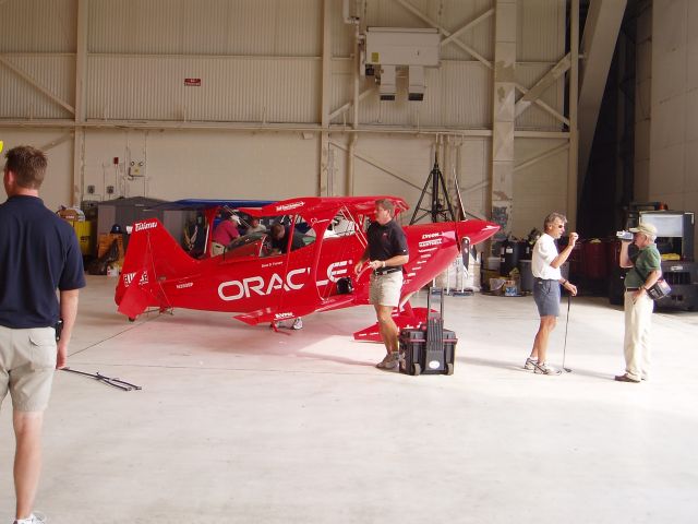 PITTS Special (S-2) (N260SP) - Sean Tuckers Dream Machine at North Kingston Airshow 06  (Sean is on the right with the golf club in hand)