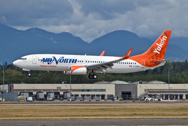 Boeing 737-800 (C-FNYU) - New addition to the fleet with a modified tail art.