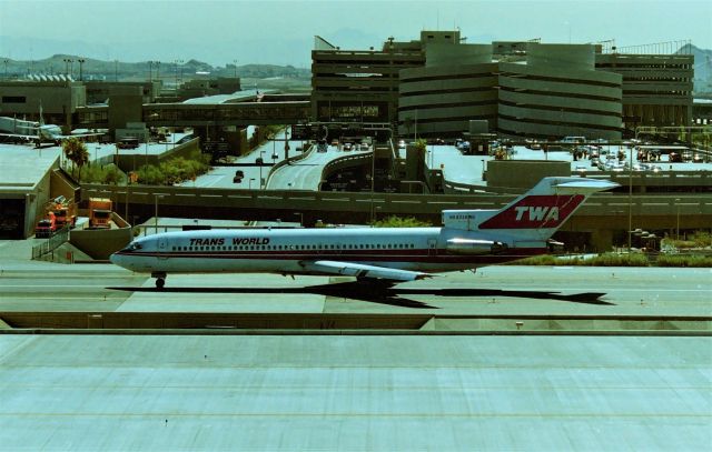 BOEING 727-200 (N54326) - KPHX - Boeing 727-200 series for TWA in July 1995 on taxi on the "chute" between the 2 terminals in 115 degree weather....my 1st trip to Phoenix ever, and for Airliners International Collectible show 1995 - No A/C in my truck ( from SJC area ) did I learn my lesson! I bought a brand new 1997 Ford Club Wagon Chateau full air, 4 captains chairs and tinted glass. I should have flown down there but I wanted to stop at Kingman AZ on the way...