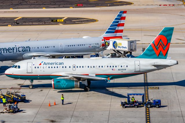 Airbus A319 (N838AW) - An American Airlines A319 in America West retro livery taxiing at PHX on 2/16/23. Taken with a Canon R7 and Tamron 70-200 G2 lens.