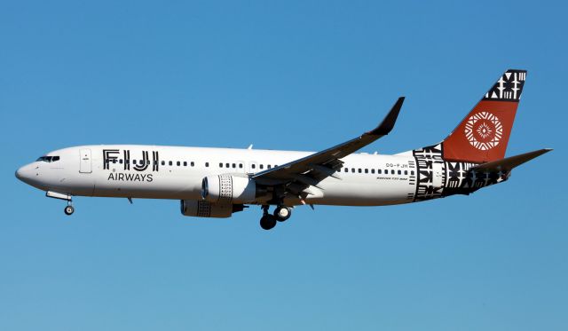 Boeing 737-800 (DQ-FJH) - Island Of GAU On Short Final To 16R