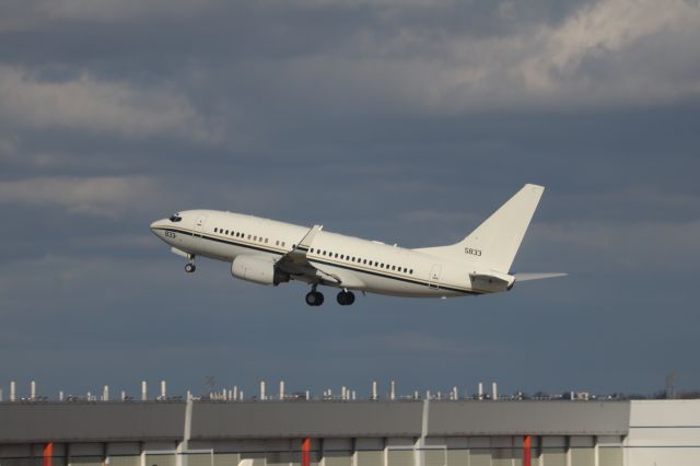 Boeing 737-700 (N5833) - US Air Force C-40A (737-700) departing. Taken from inside terminal Bravo.