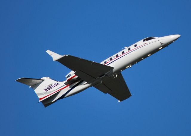 Learjet 31 (N595SA) - SPITFIRE AVIATION PARTS INC departing 20 at KJQF - 4/17/11