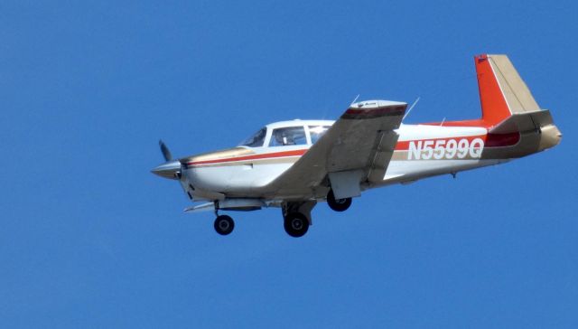 Mooney M-20 (N5599Q) - On short final is this 1965 Mooney M20C in the Spring of 2022.