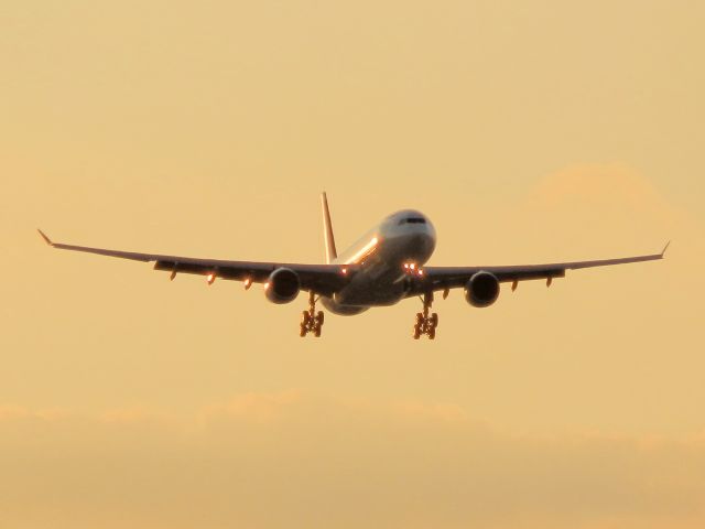 Airbus A330-300 (HB-JHB) - On finals.Enveloped by the sunset!!!