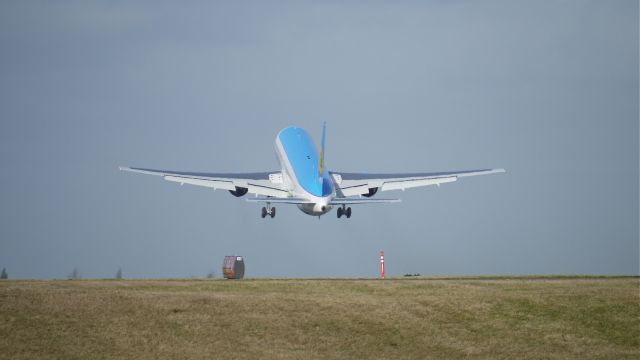 BOEING 767-300 (UK-67003) - BOE981 lifts off runway 34L on its maiden flight 1/23/12