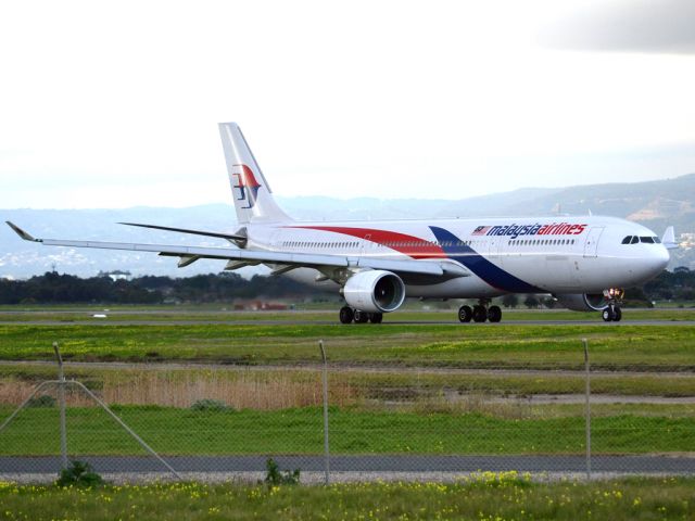 Airbus A330-300 (9M-MTC) - On taxi-way heading for take off on runway 05, for flight home to Kuala Lumpur, just before the arrival of a rain storm. Thursday 12th July 2012.