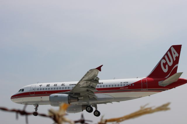 Airbus A319 (B-4091) - Beijing, XiJiao Airport Plane spotting...br /Testing my new 55-250mm lens! A little too much zoom?