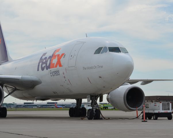 Airbus A310 (N430FE) - N40FE seen through the fence on the cargo pad at KBUF. Please look for more photos at Opshots.net