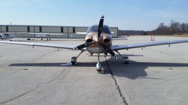 Cirrus SR-22 (N613MK) - Puddle is de-icing fluid not brake fluid!