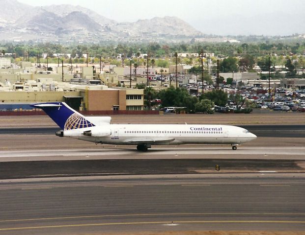 BOEING 727-200 (N578PE) - N578PE- taxis off the main runway at KPHX. This jet delv new to Alitalia, saw service with Peoples Express and then CO. Internet records also indicate this jet was a CIA plane with Area 51 connections.