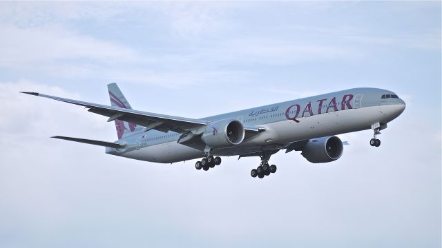 BOEING 777-300 (A7-BAV) - BOE895 on final to Rwy 16R to complete a flight test on 2/26/14. (LN:1179 cn 41740).