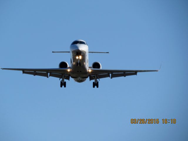 Embraer EMB-145XR (N11107) - Express Jet landing on runway 36R at Tulsa International from Houston.