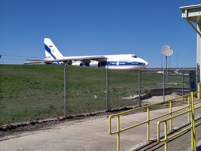 Antonov An-12 (RA-82047) - The AN124 was unloading cargo at Austin Bergstrom International Airport in Austin,Texas.