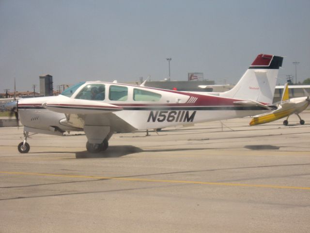 Beechcraft Bonanza (33) (N5611M) - TAXIING AT FULLERTON