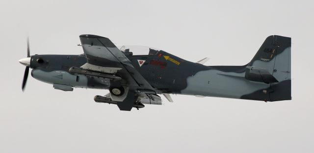 Embraer A-27 Tucano (N484MT) - This is the first picture of N484MT to be posted in the FA photo gallery, and it catches the pilot putting the tread to bed as the Short Tucano (an authorized production variant of an Embraer EMB-312 Tucano) climbs away from Reno Tahoe International.br /* Info Note ... "Sauvetage" means "Rescue."  I looked it up to be sure.  (Grin ) *br /To view this photo in best Q, I recommend skipping both of the little thumbnails and clicking on FULL.