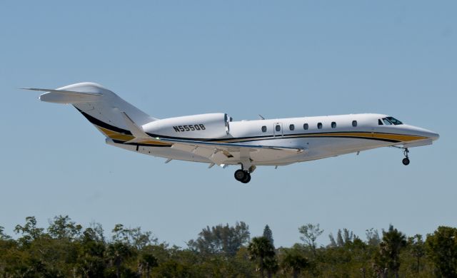 Cessna Citation X (N555QB) - Over threshold at Naples Florida on 3-16-2017.