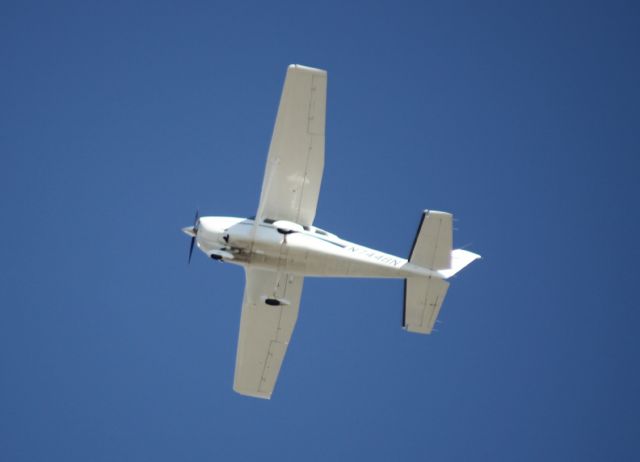 Cessna 206 Stationair (N7448N) - Short take off, Fast climb out from 30R passing directly over me, it seemed as though, pilot challenged me to get the shot.