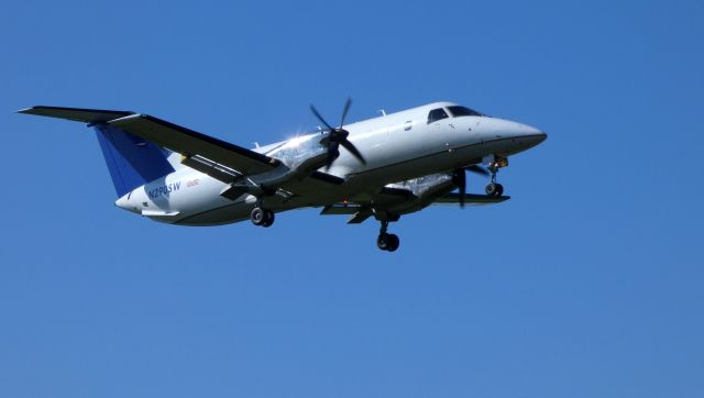 Embraer EMB-120 Brasilia (N290SW) - On final is this 1996 Embraer 120ER Brasilia aircraft in the Summer of 2019. Formerly a passenger plane up until 2014.