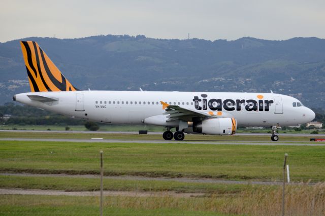 Airbus A320 (VH-VNC) - On taxiway heading for take-off on runway 05. Thursday, 19 June 2014.