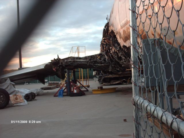 Boeing 737-700 (N18611) - The Continental flight that never left Denver. Flight 1404, they put the remains on the Continental hangar ramp for the investigation.