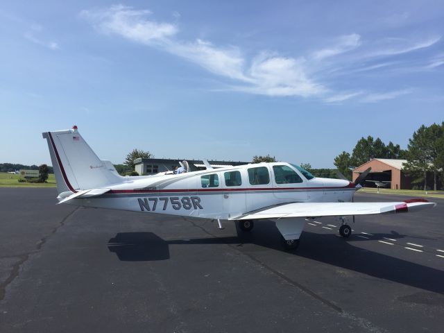 Beechcraft Bonanza (36) (N7758R) - On the ramp at Madison, MS