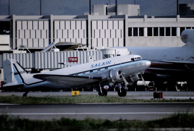N8461A — - KSFO - late 1980s at SFO - SALAIR DC-3 headed to the runway 1L for departure